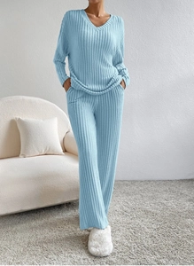 Detail of sky blue ribbed knit loungewear set featuring V-neck top and wide-leg trousers