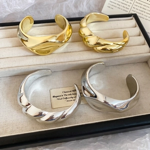 Minimalist twisted acrylic open cuff bracelet in gold and silver finish set