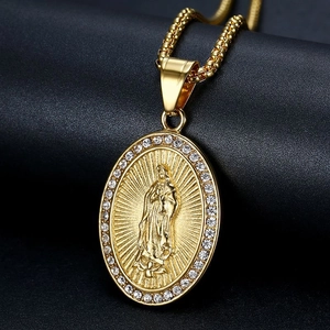 Iced out Virgin Mary pendant in gold plated stainless steel with shimmering micro pavé stones