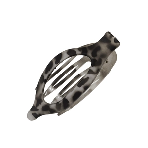 Minimalist oval matte hair claw clip in black and white leopard print pattern