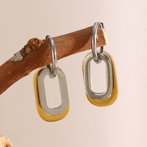 Minimalist 18K gold plated stainless steel intertwined oval earrings on a branch