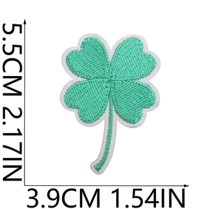 Detailed view of green clover embroidery patch with size dimensions 5.5cm by 3.9cm