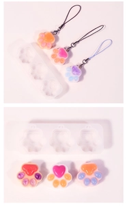 Detailed view of cat paw silicone molds with colorful resin keychain pendant results