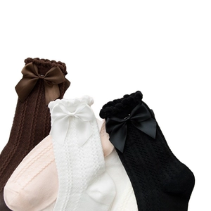 Japanese style knee-high knit socks with ribbon bows in four classic colors