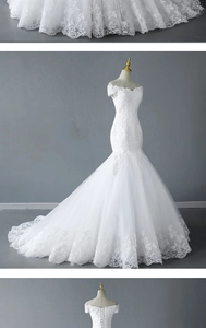 Exquisite lace hem details and embroidery on a white mermaid wedding gown train