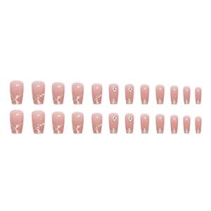Short ballet pink press-on nails with pearls, glitter gradients, and sparkling rhinestones