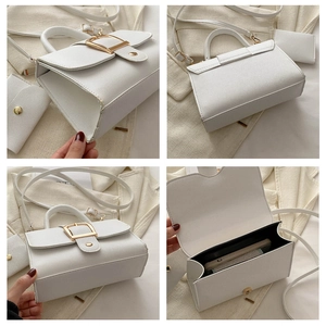 Detail view of white PU leather crossbody bag with gold buckle, strap and small card pouch