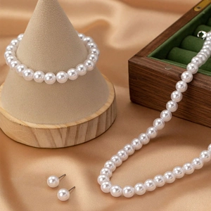Elegant 8mm white pearl jewelry set including necklace, bracelet and stud earrings