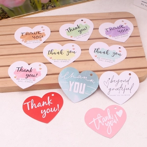 Assorted heart-shaped paper thank you tags for small business jewelry packaging and gifts