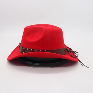 Detailed view of a red felt cowboy hat with a studded leather band and woven accents
