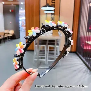 Detail of a black plastic headband with colorful sunflowers, diameter size 11.3cm