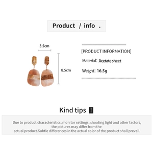 Detailed dimensions of brown acetate oval earrings with 3.5cm width and 8.5cm height