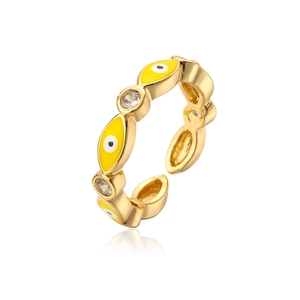 Detailed view of gold plated adjustable ring featuring yellow evil eye and cubic zirconia