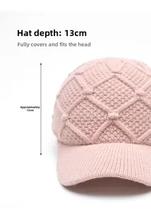 Pink knitted baseball cap with 13cm depth and textured diamond pattern detail