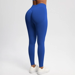 Detail of royal blue high waist yoga pants showing peach lift seam and breathable fabric