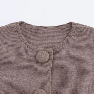 Women's knit cardigan in deep coffee purple featuring fabric-covered button details