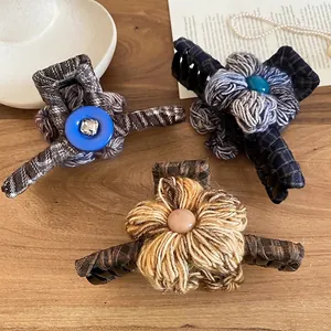 Three retro fabric knit flower hair claws with plaid pattern and pearl accents