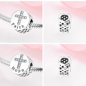 Macro detail of S925 silver charm with Faith Hope engraving and cubic zirconia cross