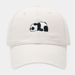 Close-up of cute panda embroidery on a cream cotton baseball cap with curved brim