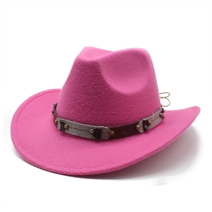 Detail of rose pink western cowboy felt hat with studded leather decorative band