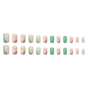 Faux ongles vert pastel et crème avec motifs de marguerites et pointes French chic