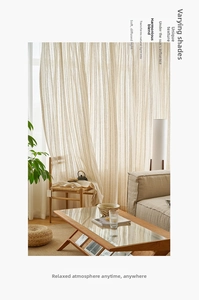 Detailed macro view of cream-white vertical striped texture on Japanese linen sheer curtains