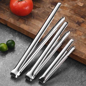 Three-piece set of SUS 304 stainless steel food tongs for ice and sugar on dark countertop