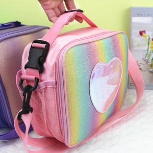 Close-up of pink glitter heart lunch bag with adjustable shoulder strap and mesh side pocket