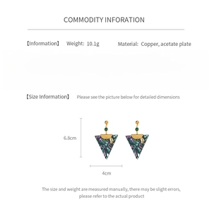 Detailed spec sheet showing 10.1g copper acetate earrings with 6.8cm triangle drop