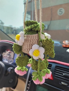 Detailed close-up of handmade crochet potted plant car mirror hanging accessory