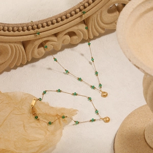 French vintage gold shell and emerald green bead necklace and bracelet jewelry set