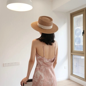 Women's French vintage straw flat top hat with elegant white ribbon for beach vacation