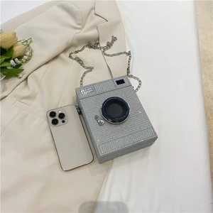 Vintage silver rhinestone camera bag with metal chain strap and luxury crystal finish