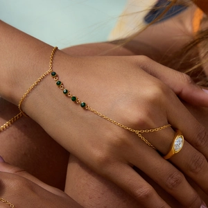 18K gold plated stainless steel hand chain with green zircons and marquise stone