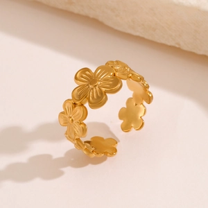 Adjustable golden stainless steel open ring featuring a continuous floral blossom design