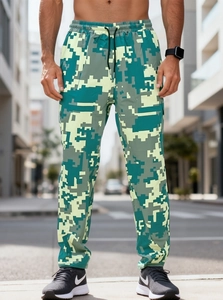 Detail of digital camouflage cargo pants featuring elastic drawstring waist and street style