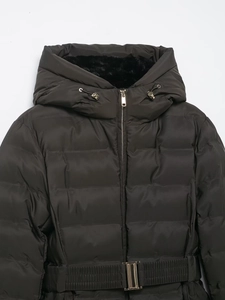 Detail of waterproof hooded jacket showing metal zipper and warm plush lining