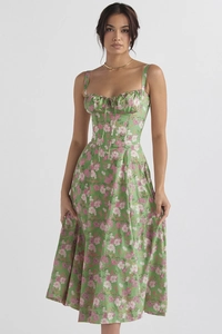 Detailed shot of a green floral summer midi dress with spaghetti straps and slim fit
