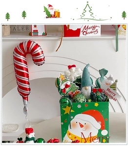 Christmas gift set with candy cane balloon, plush gnome and snowman gift box for holidays
