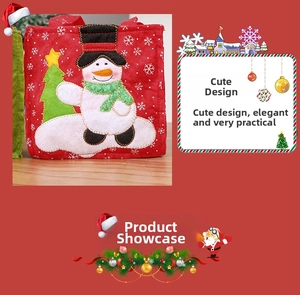 Detail of red Christmas gift bag with snowman appliqué and delicate snowflake embroidery