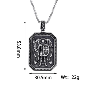 Detailed size view of retro relief shield pendant measuring 53.8mm high and 30.5mm wide