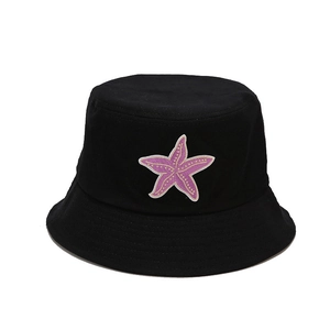 Black cotton bucket hat featuring a purple starfish embroidery for outdoor sun protection