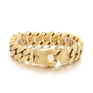 Golden stainless steel Cuban chain bracelet with intricate vintage floral carvings