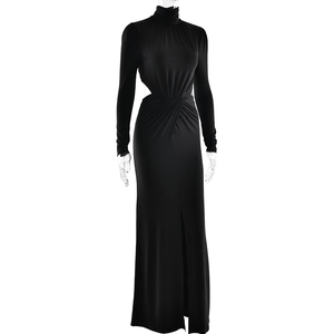 Detail of waist cutout and twist knot texture on this elegant black maxi dress