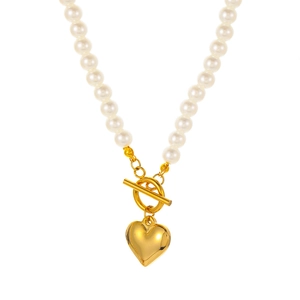 Elegant pearl beaded necklace featuring a gold heart pendant and secure OT toggle clasp
