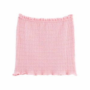 Close-up of pink knit tube top showing ruffled edges and delicate mesh texture