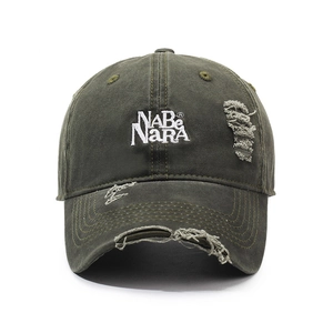 Distressed olive green baseball cap with NABNARA embroidery and torn details