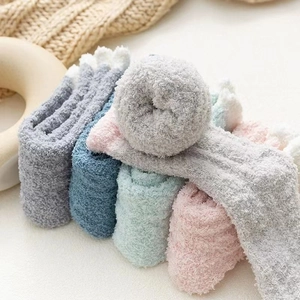 Plush coral fleece thick socks in assorted pastel colors for winter warmth and comfort