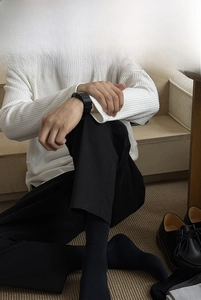 Detail of black cotton business sock with reinforced heel and antibacterial fabric