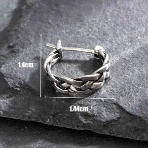Vintage oxidized stainless steel hoop earrings with woven texture on dark stone